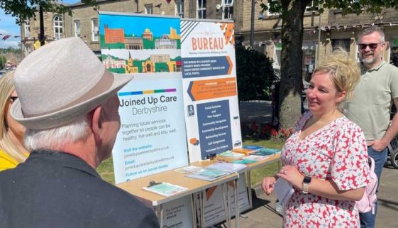 Information Stall with People in Glossop